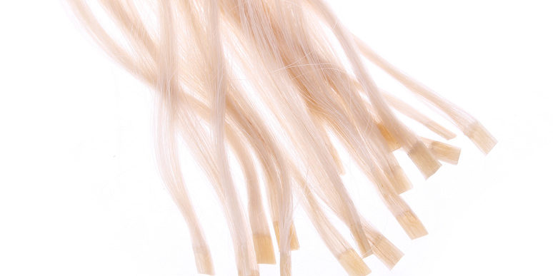 keratin capsules of blonde hair extensions isolated